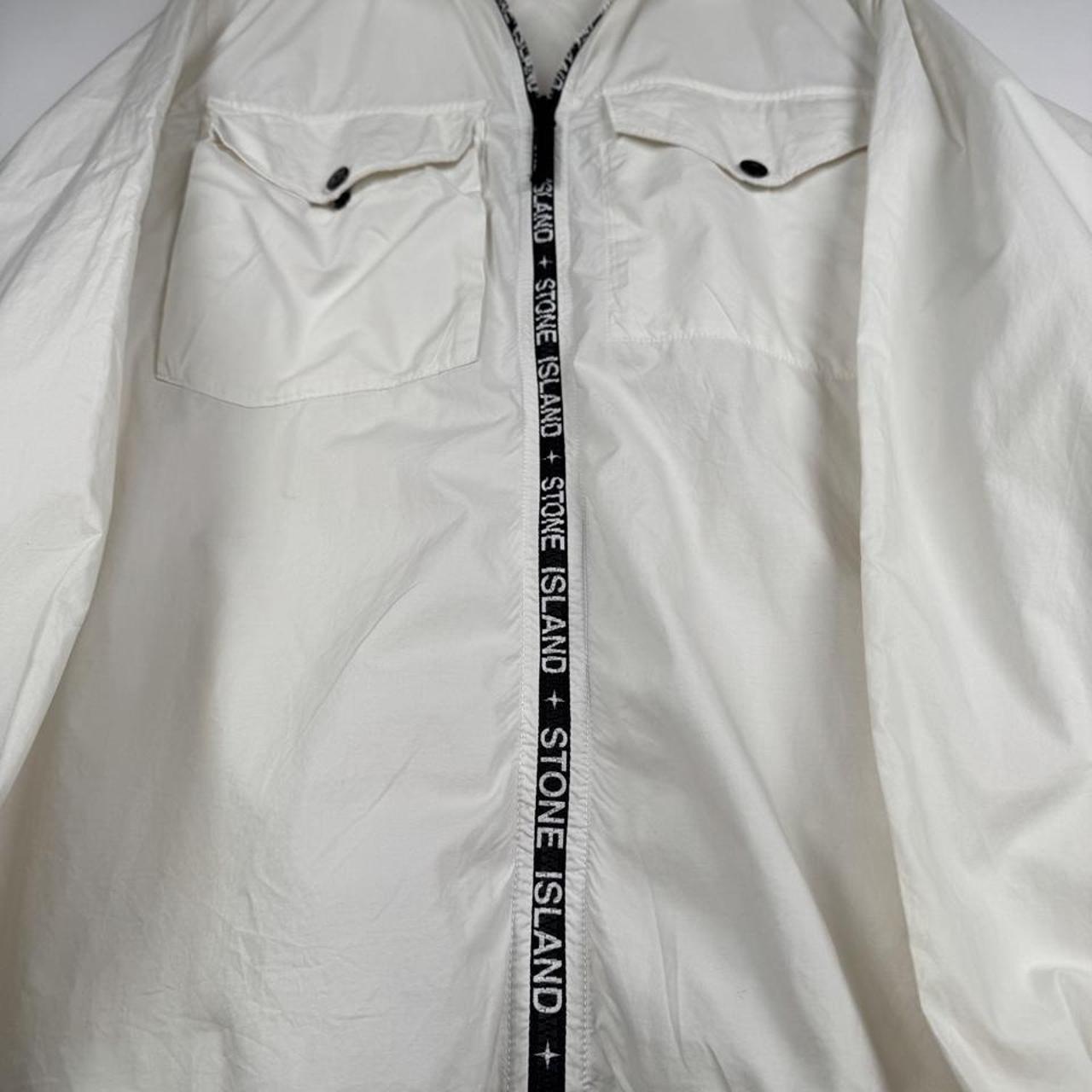 Stone Island shell jacket XL, black with logo trim and lightweight material.