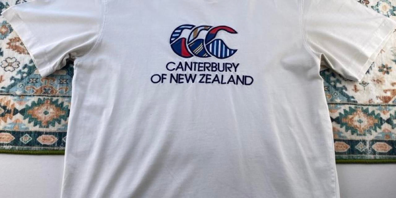 Canterbury pocket t-shirt, navy blue, embroidered logo, regular fit, cotton material.