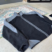 Oakley fleece jacket in cream with embroidered spellout logo and soft sherpa texture.