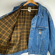 Carhartt denim trucker jacket 1990s style with classic logo and relaxed fit.