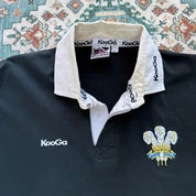 Kooga men's polo shirt in Prince of Wales pattern, featuring logo and regular fit.