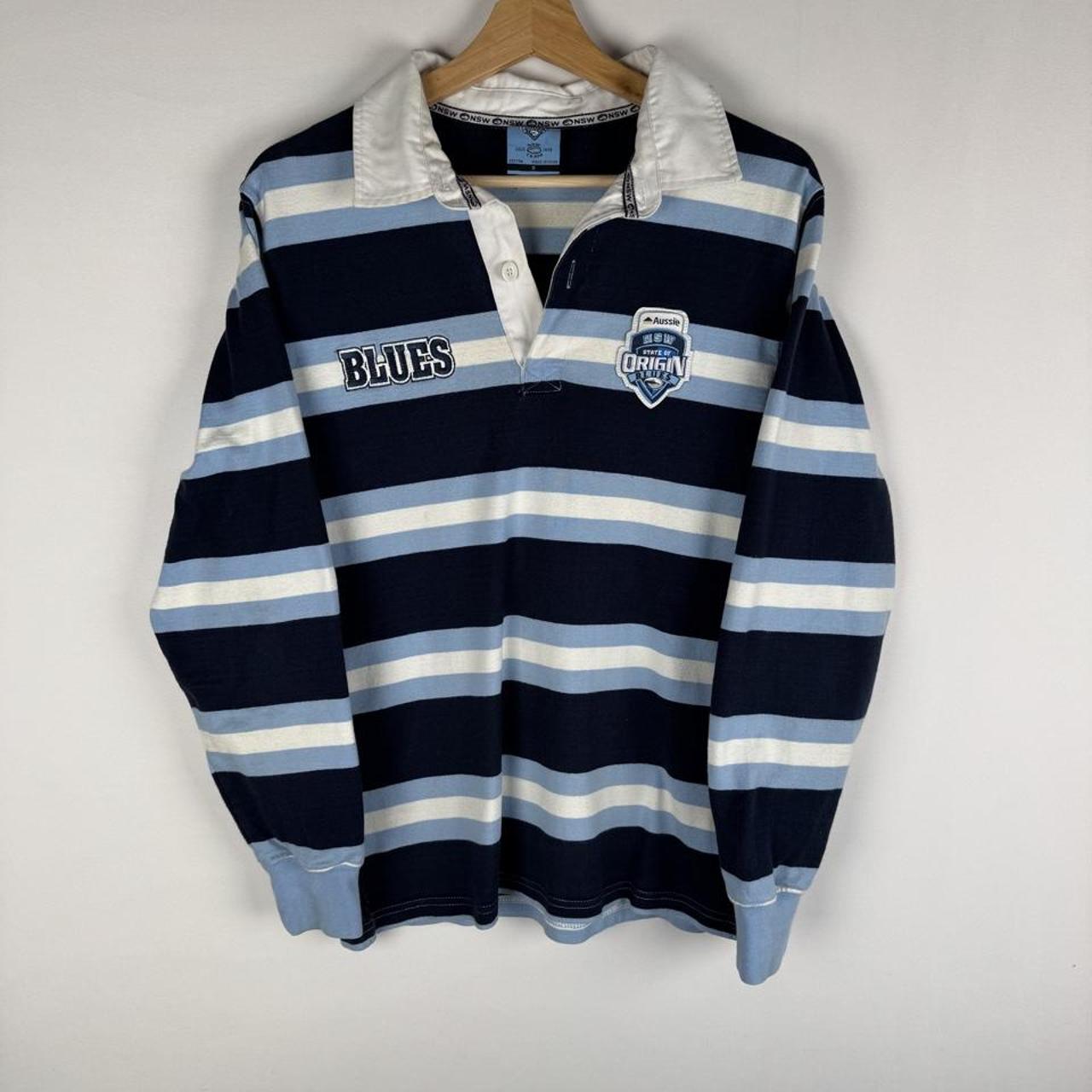 State Of Origin blue rugby polo shirt with logo and slim fit design.