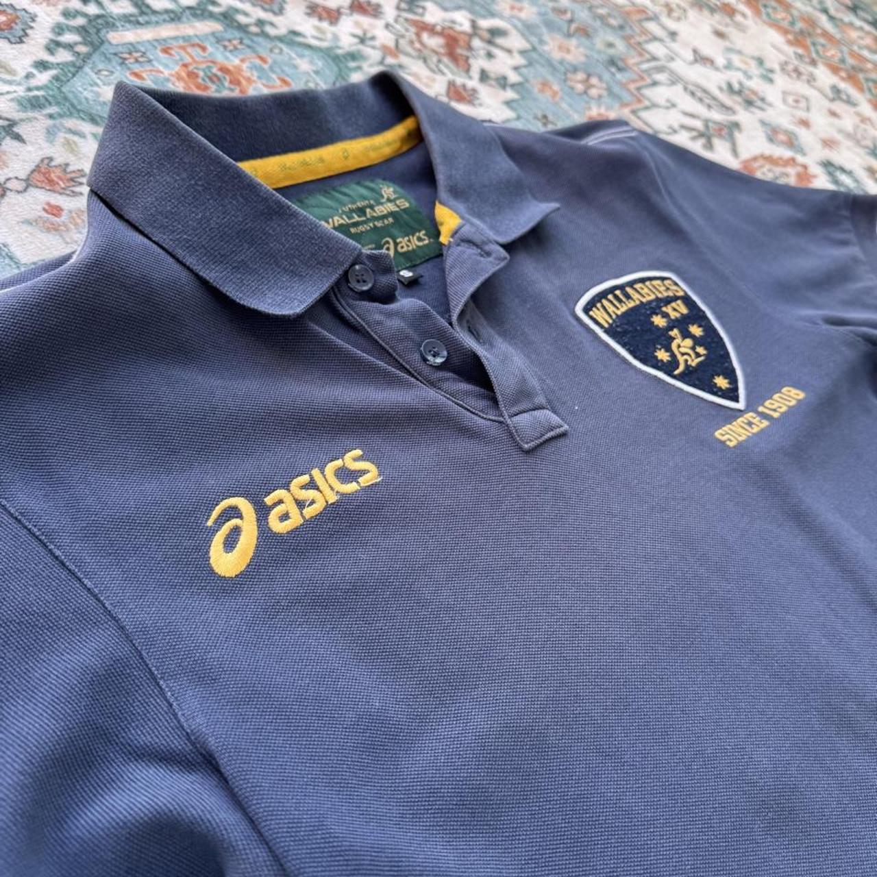 ASICS Wallabies rugby polo shirt green with logo and slim fit design.