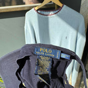 Polo Ralph Lauren navy hat with embroidered logo and adjustable strap.