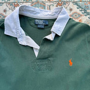 Polo Ralph Lauren green rugby polo shirt with embroidered logo and thick fabric.