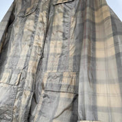 Barbour cream checkered parachute field jacket with relaxed fit and distinctive logo.