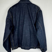 Carhartt WIP blue denim jacket with logo patch and classic design details.