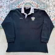 Kooga men's polo shirt in Prince of Wales pattern, featuring logo and regular fit.