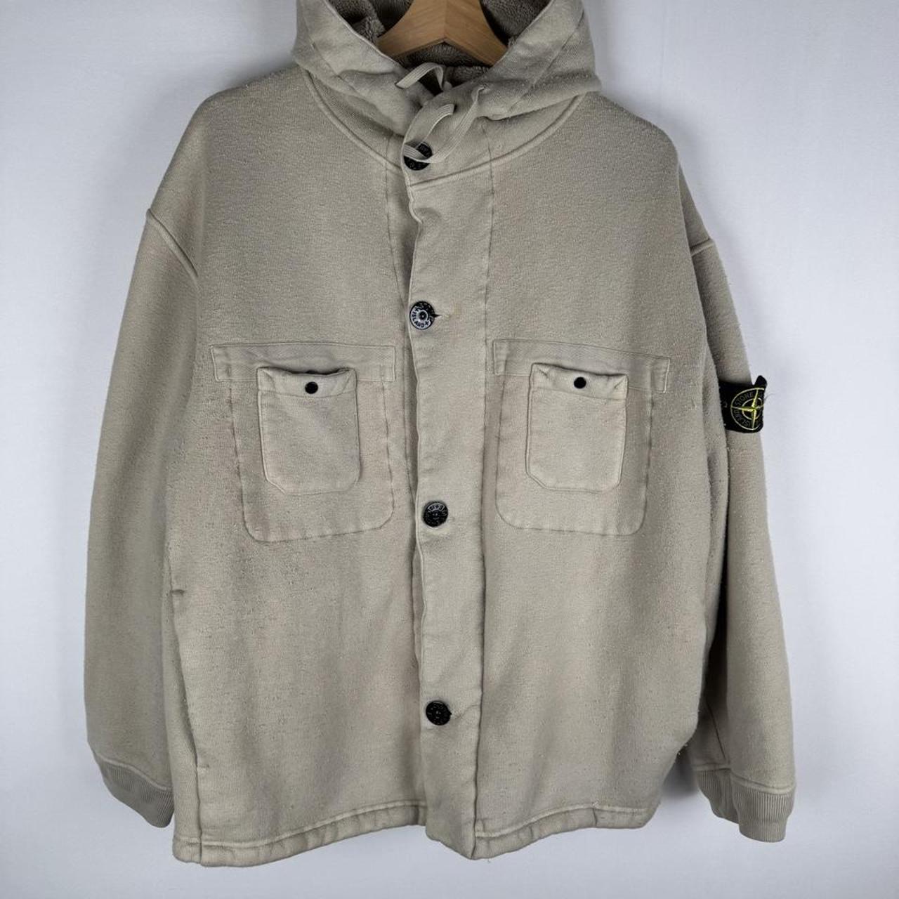 Stone Island cream hoodie jacket with sherpa lining and logo patch.