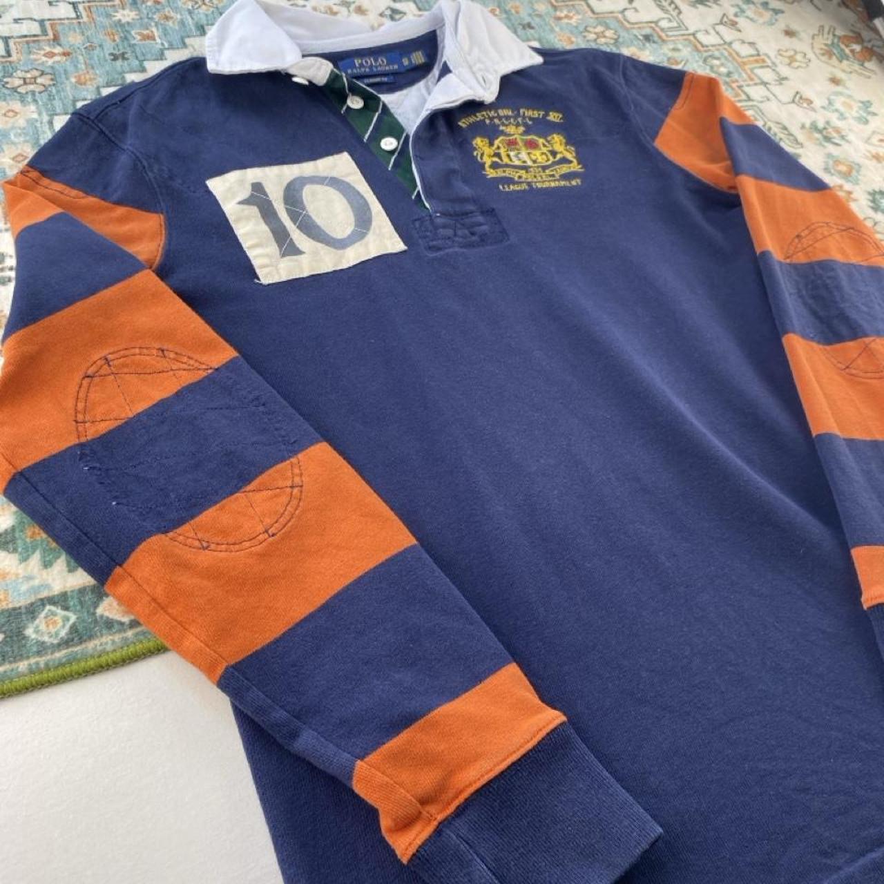 Polo Ralph Lauren oversized rugby polo shirt navy blue with embroidered logo and classic stripes.