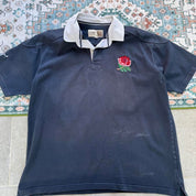 Cotton Traders men's polo shirt navy blue with England Rugby logo and white collar.