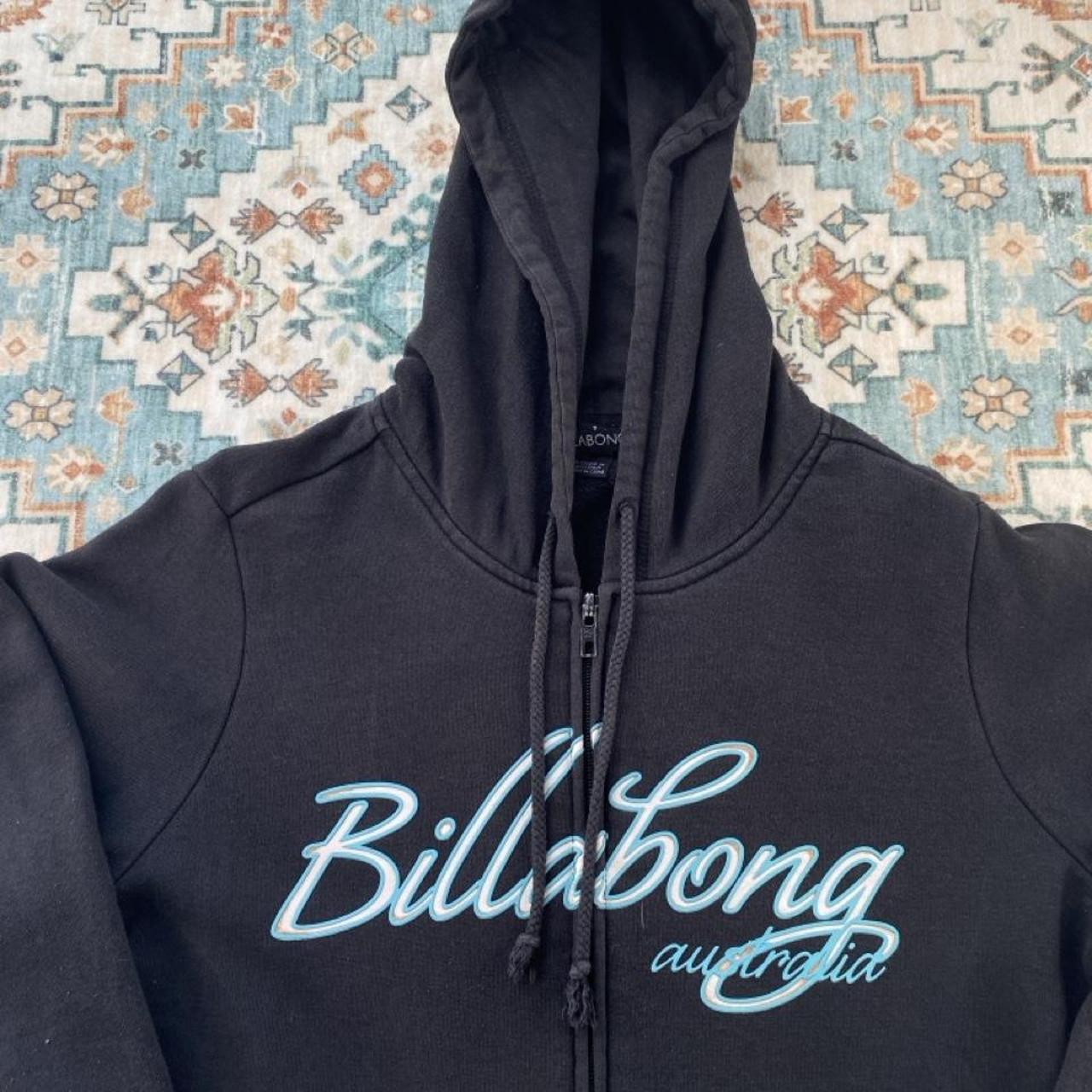 Billabong black oversized full zip hoodie with logo detail and soft material.