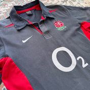 Nike England rugby polo shirt red with embroidered logo and classic collar.