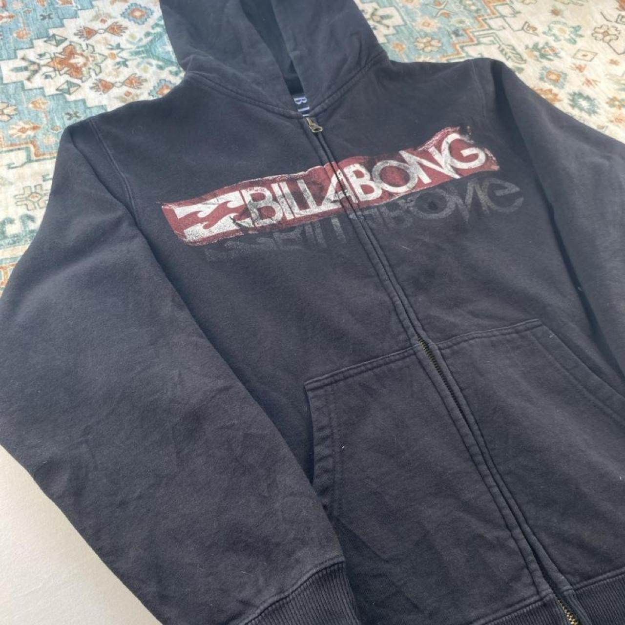 Billabong full zip hoodie for boys, navy blue, featuring logo and soft cotton material.