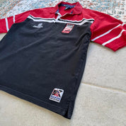 Kooga men's rugby polo shirt, navy blue, embroidered Dubai 7s logo, cotton material.