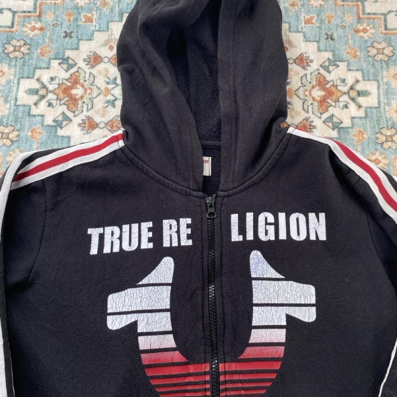 True Religion black and white full zip hoodie with logo and contrast stitching.