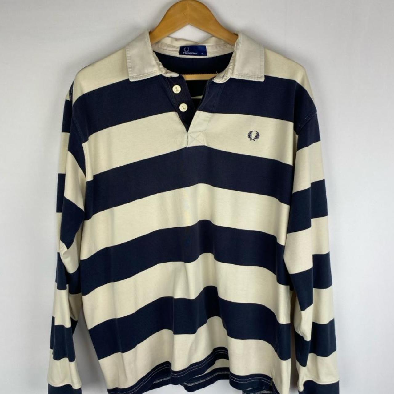 Fred Perry men's rugby polo shirt cream and navy stripes with logo detail.