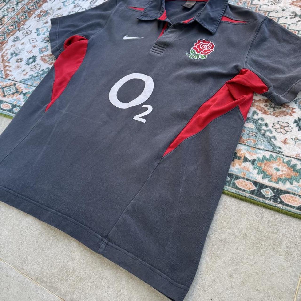 Nike England rugby polo shirt red with embroidered logo and classic collar.