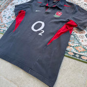 Nike England rugby polo shirt red with embroidered logo and classic collar.