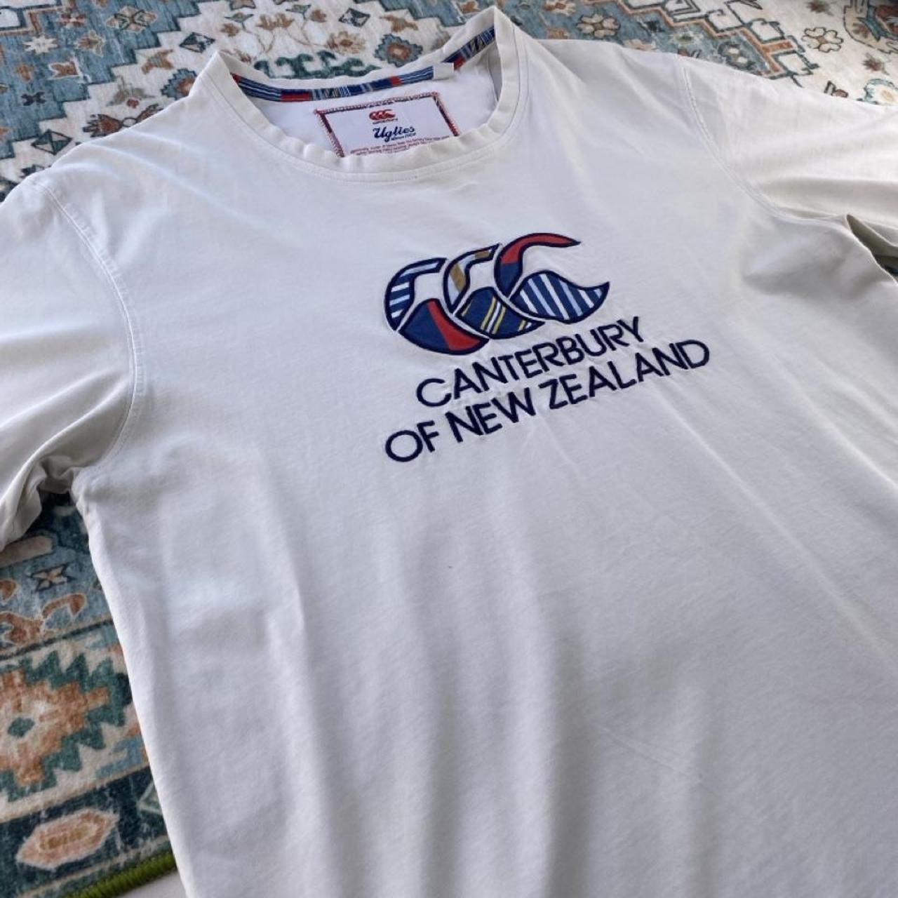 Canterbury pocket t-shirt, navy blue, embroidered logo, regular fit, cotton material.
