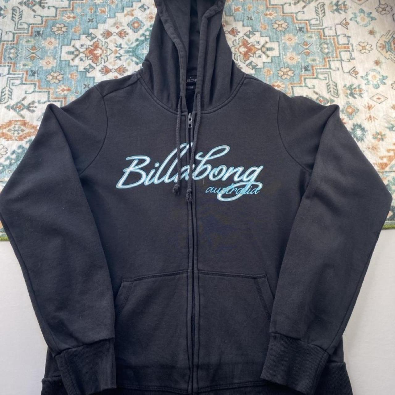 Billabong black oversized full zip hoodie with logo detail and soft material.