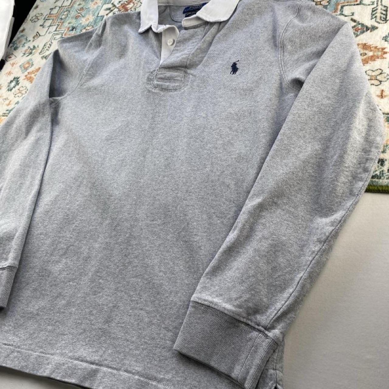 Polo Ralph Lauren grey rugby polo shirt with embroidered logo and classic collar.