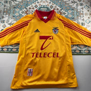 Adidas orange Benfica away jersey with embroidered logo and vintage design details.