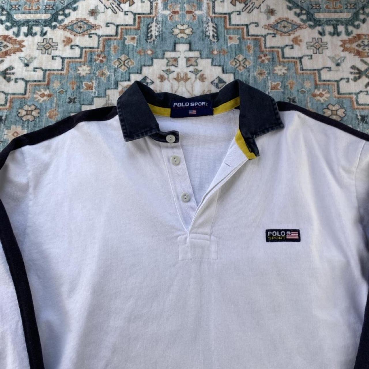 Polo Ralph Lauren white rugby polo shirt with embroidered logo and classic fit.