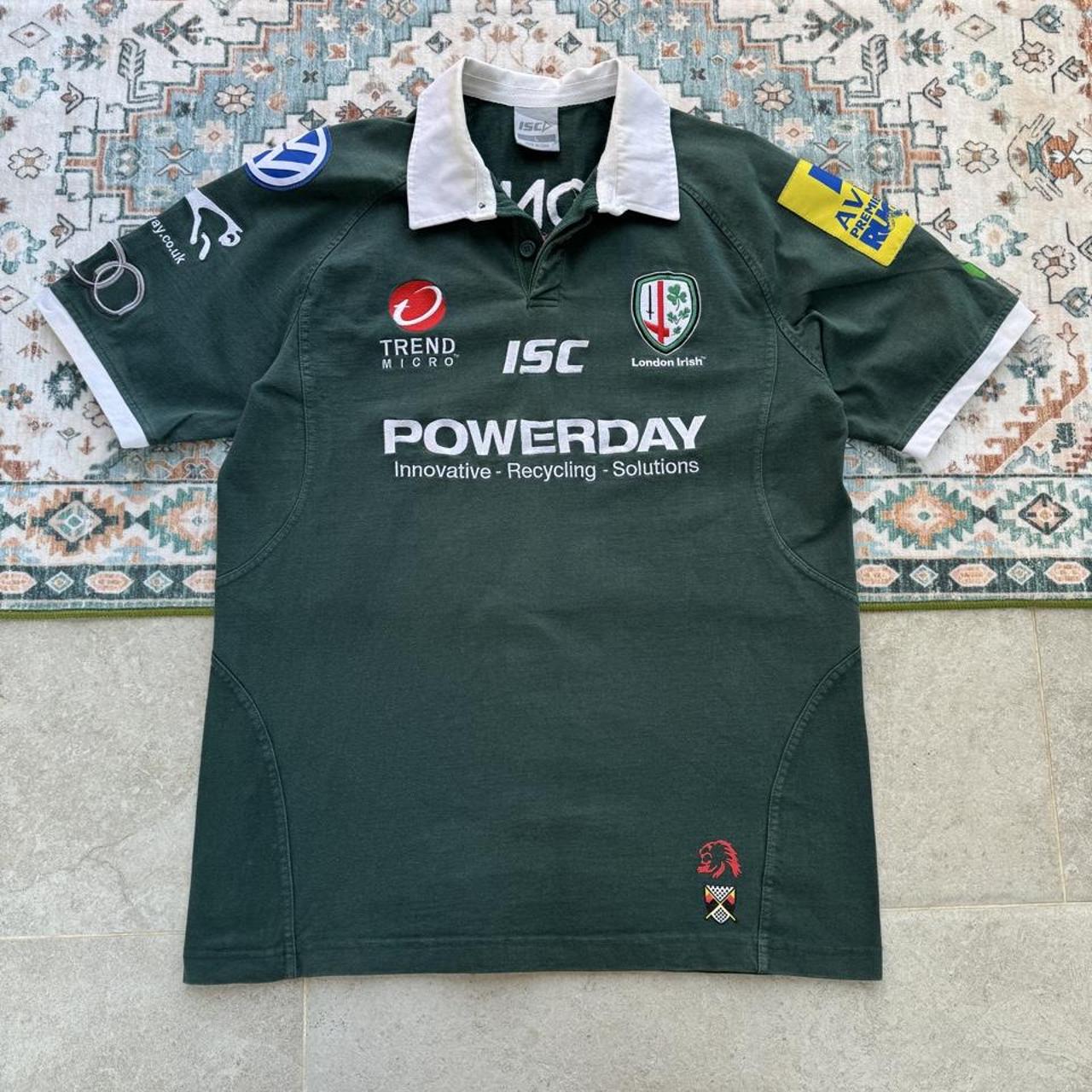 ISC green rugby polo shirt with embroidered London Irish logo and slim fit.
