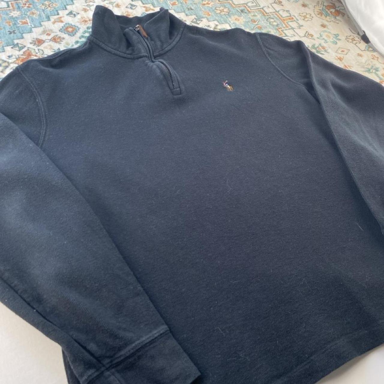 Polo Ralph Lauren black and brown quarter zip jumper with embroidered logo and soft fabric.