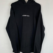 Stüssy grey hoodie with NYC centre print and backprint, relaxed fit.