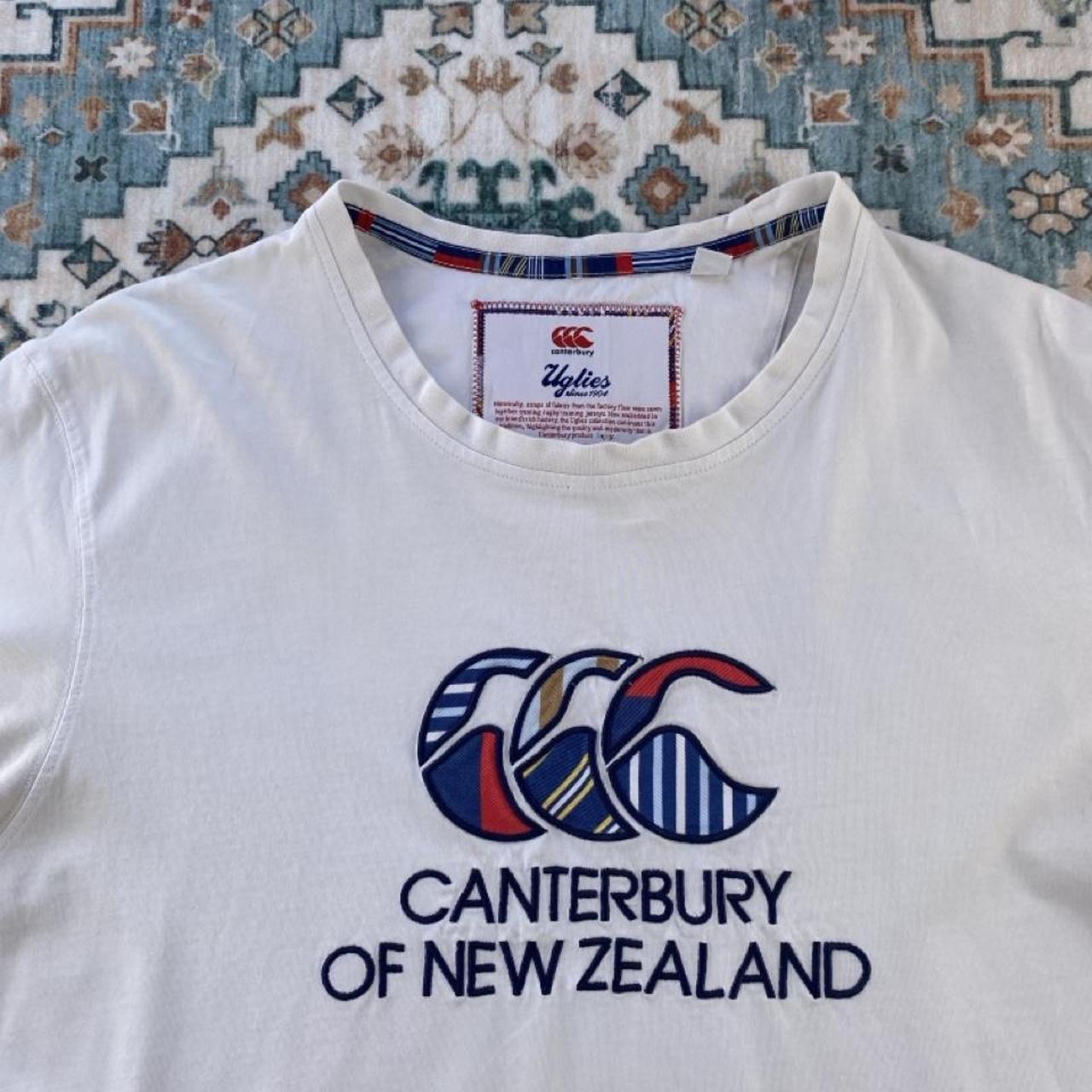 Canterbury pocket t-shirt, navy blue, embroidered logo, regular fit, cotton material.