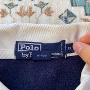 Polo Ralph Lauren oversized rugby polo, thick fabric, striped panels, classic logo.