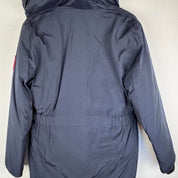 Canada Goose navy parka jacket with logo patch and fur-lined hood.