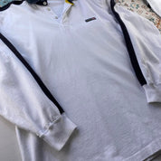 Polo Ralph Lauren white rugby polo shirt with embroidered logo and classic fit.