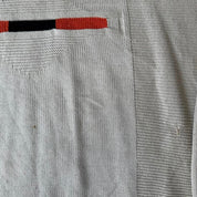 Nike cream knitted jumper with embroidered logo and visible marks from the 1990s.