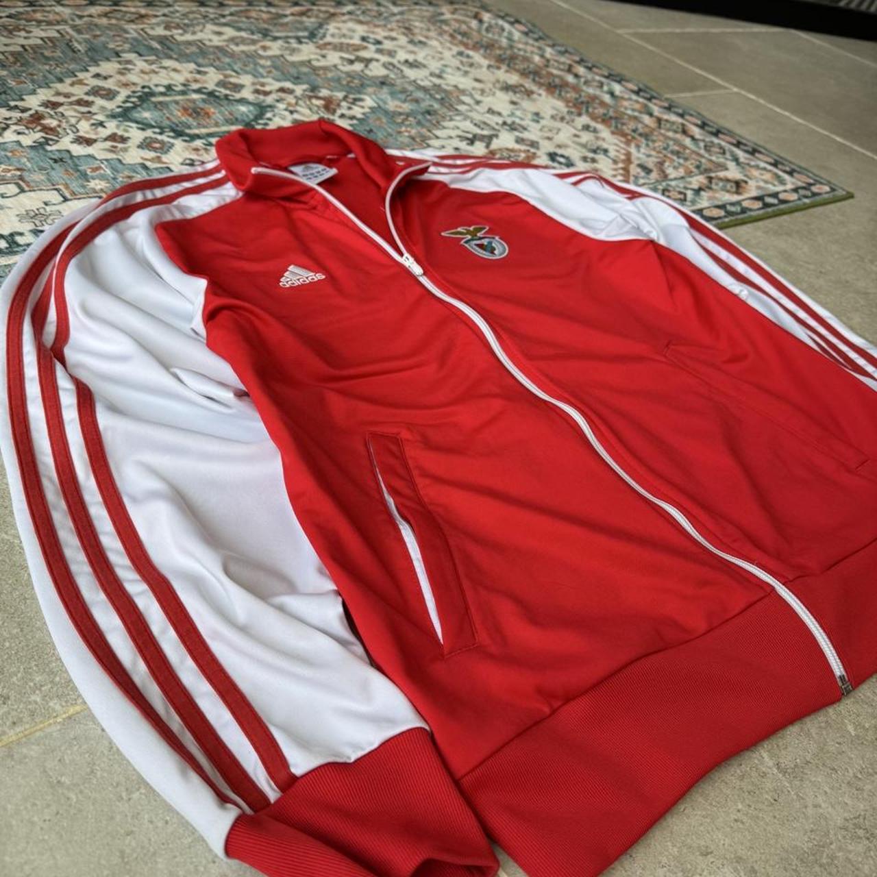 Adidas Benfica track jacket red with white logo and sporty design details.