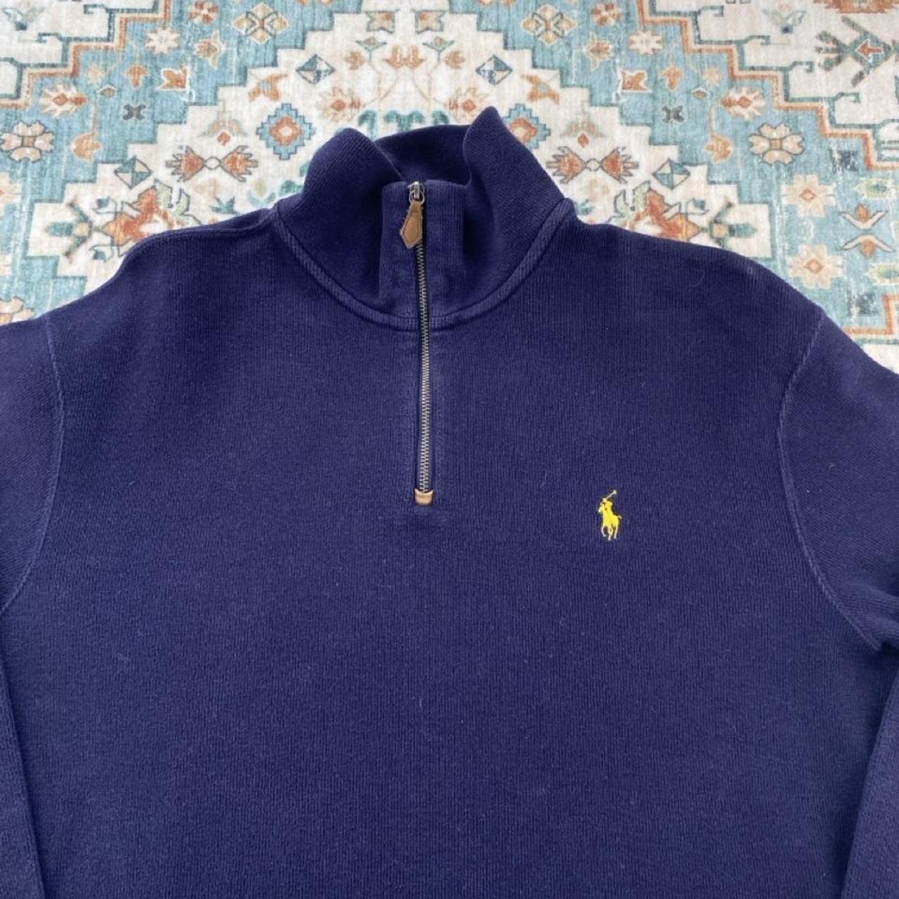 Polo Ralph Lauren navy jumper with embroidered pony logo and quarter zip detail.