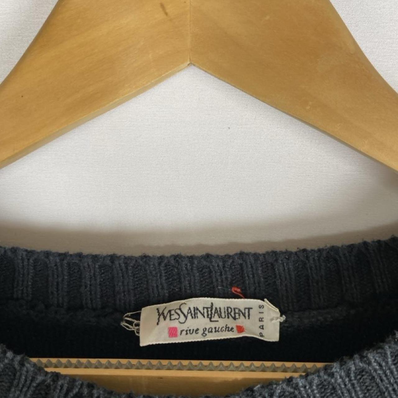 Yves Saint Laurent grey knitted jumper 1990s style with relaxed fit and ribbed texture.