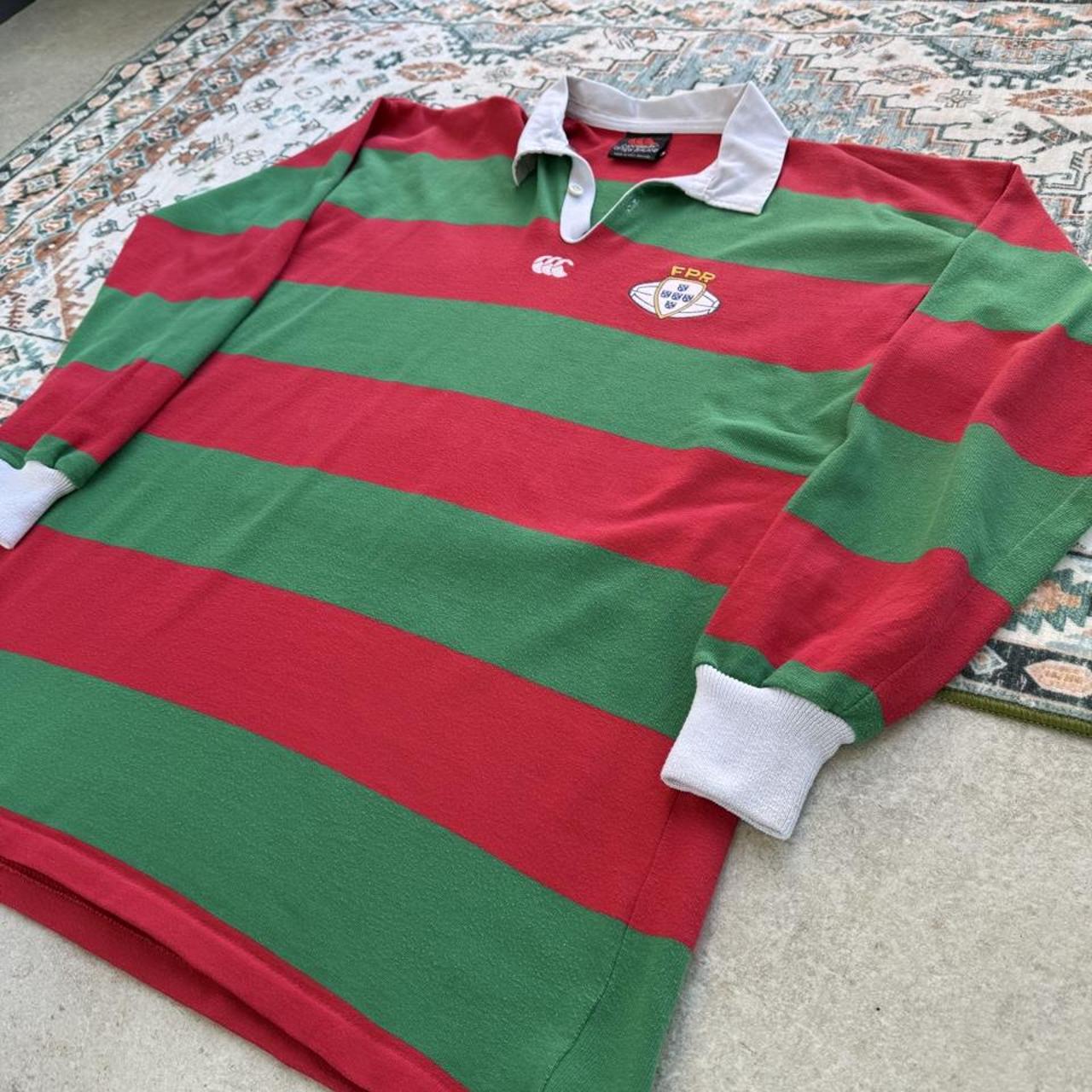 Canterbury men's rugby polo shirt red with embroidered Portugal logo and classic collar.