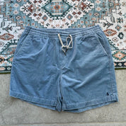 Polo Ralph Lauren baby blue corduroy shorts with logo patch and classic cut.