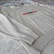Nike cream knitted jumper with embroidered logo and visible marks from the 1990s.