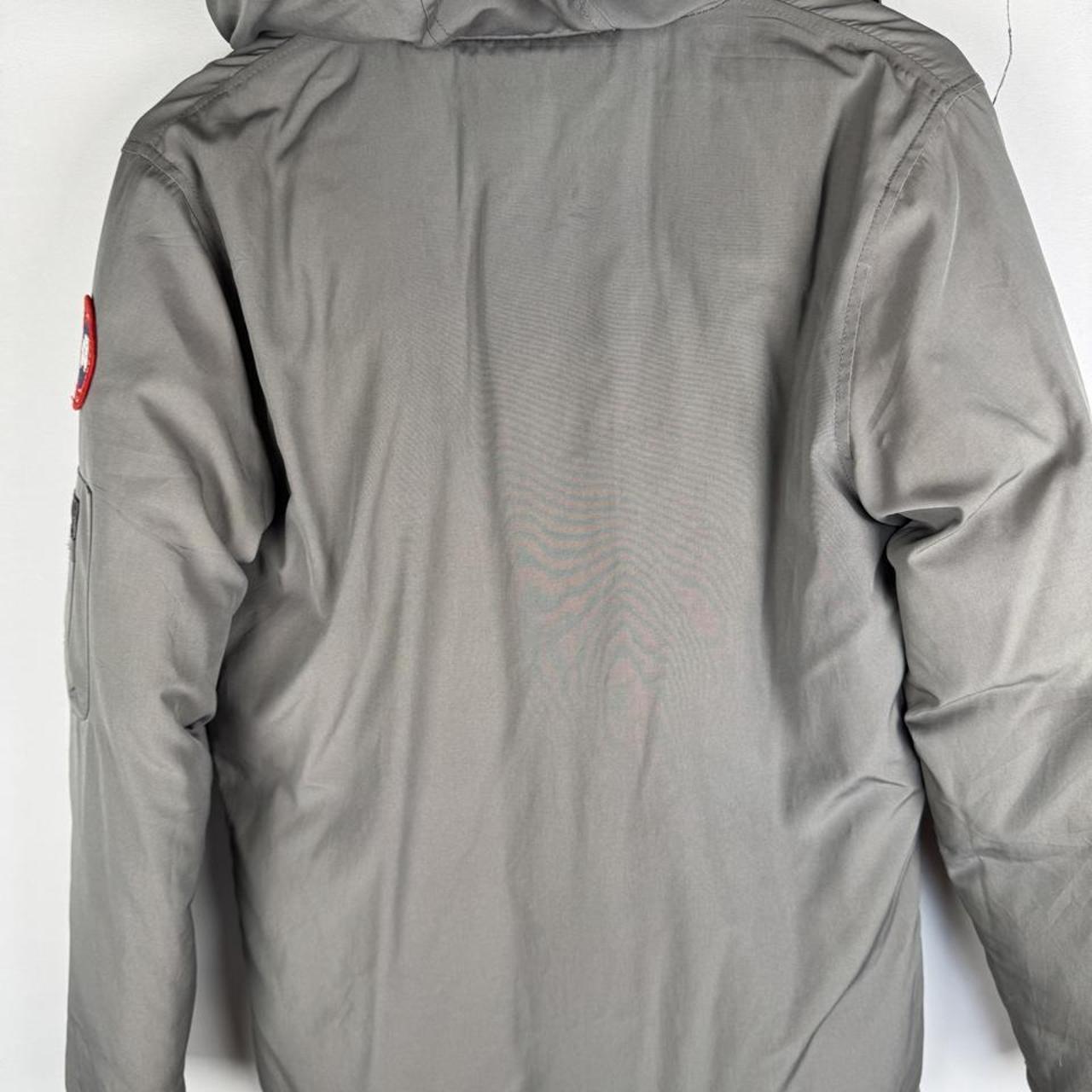 Canada Goose black Montebello parka jacket with fur-lined hood and logo patch.