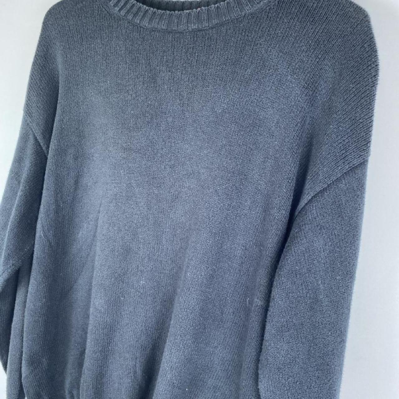 Yves Saint Laurent grey knitted jumper 1990s style with relaxed fit and ribbed texture.
