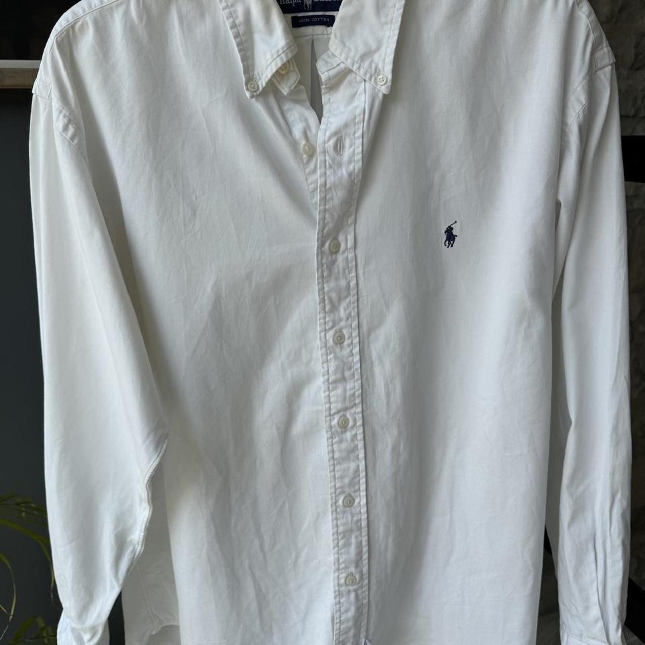 Polo Ralph Lauren white cotton shirt with embroidered logo and oversized fit.