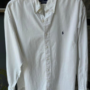 Polo Ralph Lauren white cotton shirt with embroidered logo and oversized fit.