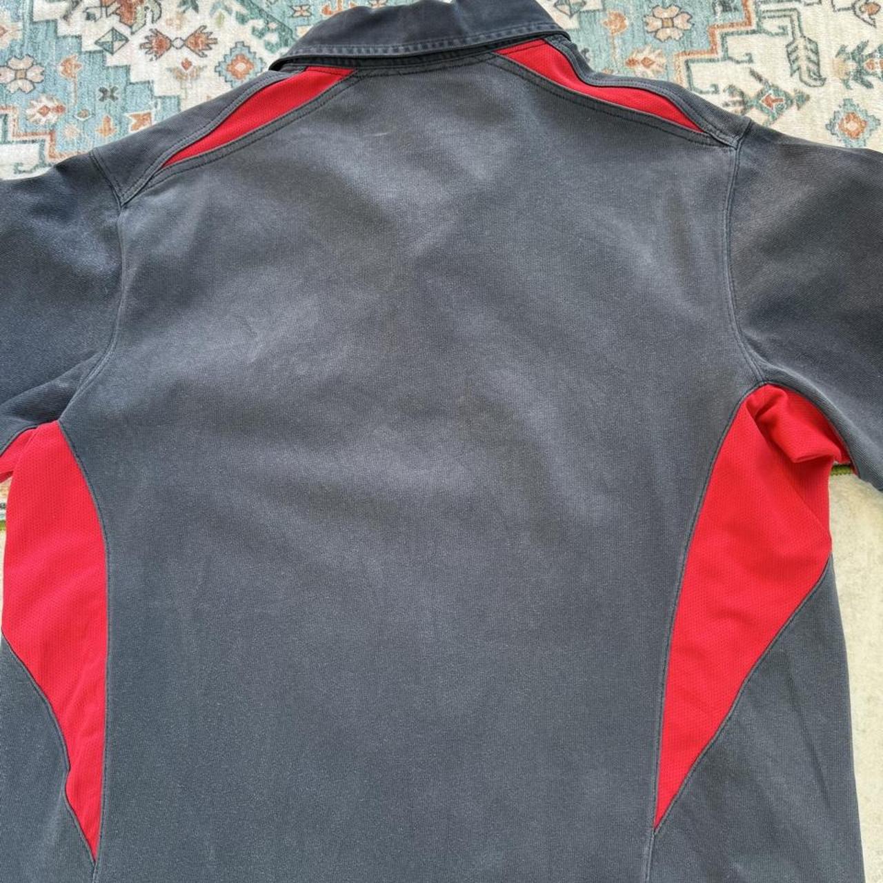 Nike England rugby polo shirt red with embroidered logo and classic collar.