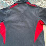 Nike England rugby polo shirt red with embroidered logo and classic collar.