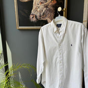 Polo Ralph Lauren white cotton shirt with embroidered logo and oversized fit.