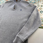 Polo Ralph Lauren grey quarter zip jumper with embroidered pony logo and slim fit.